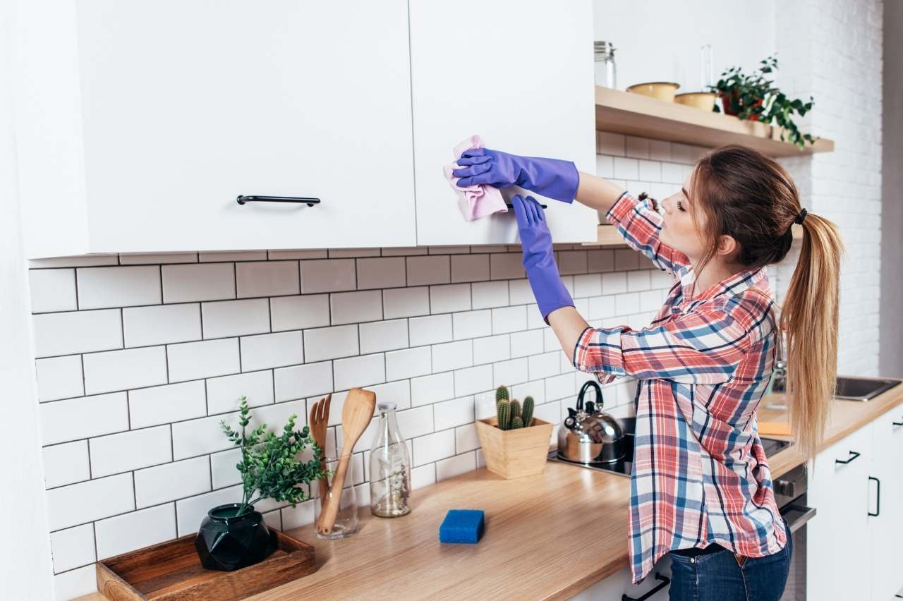 cleaning the kitchen