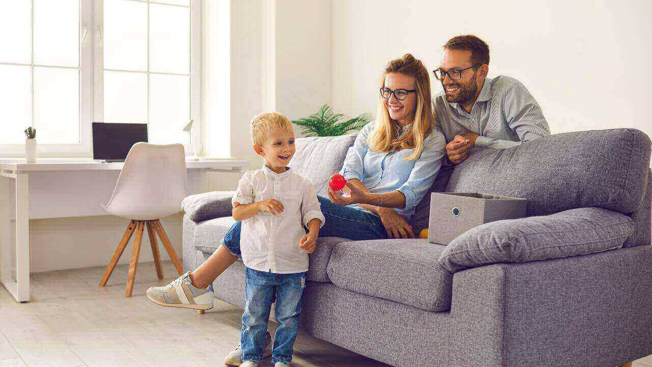 a family sitting in a living room